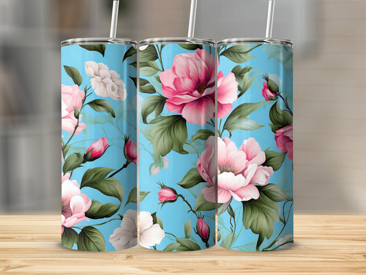 Three blue tumblers with a pink and white floral pattern.