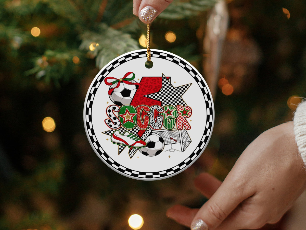 Round soccer ornament with festive designs and the word "SOCCER"