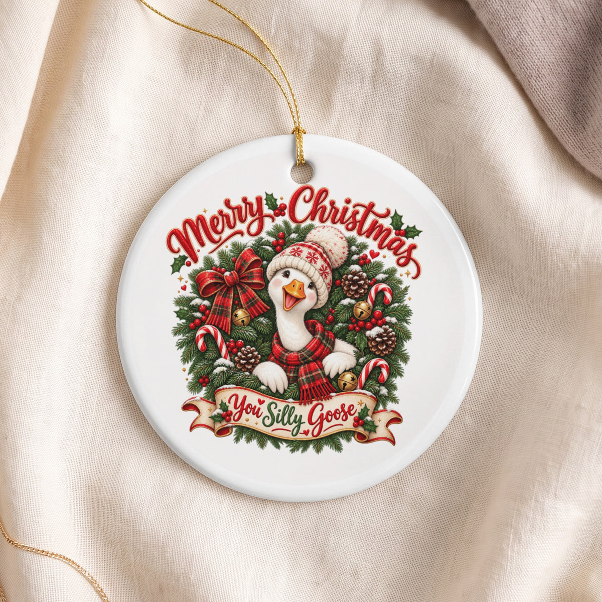 Round ornament with goose in hat and scarf, "Merry Christmas" and "You Silly Goose".