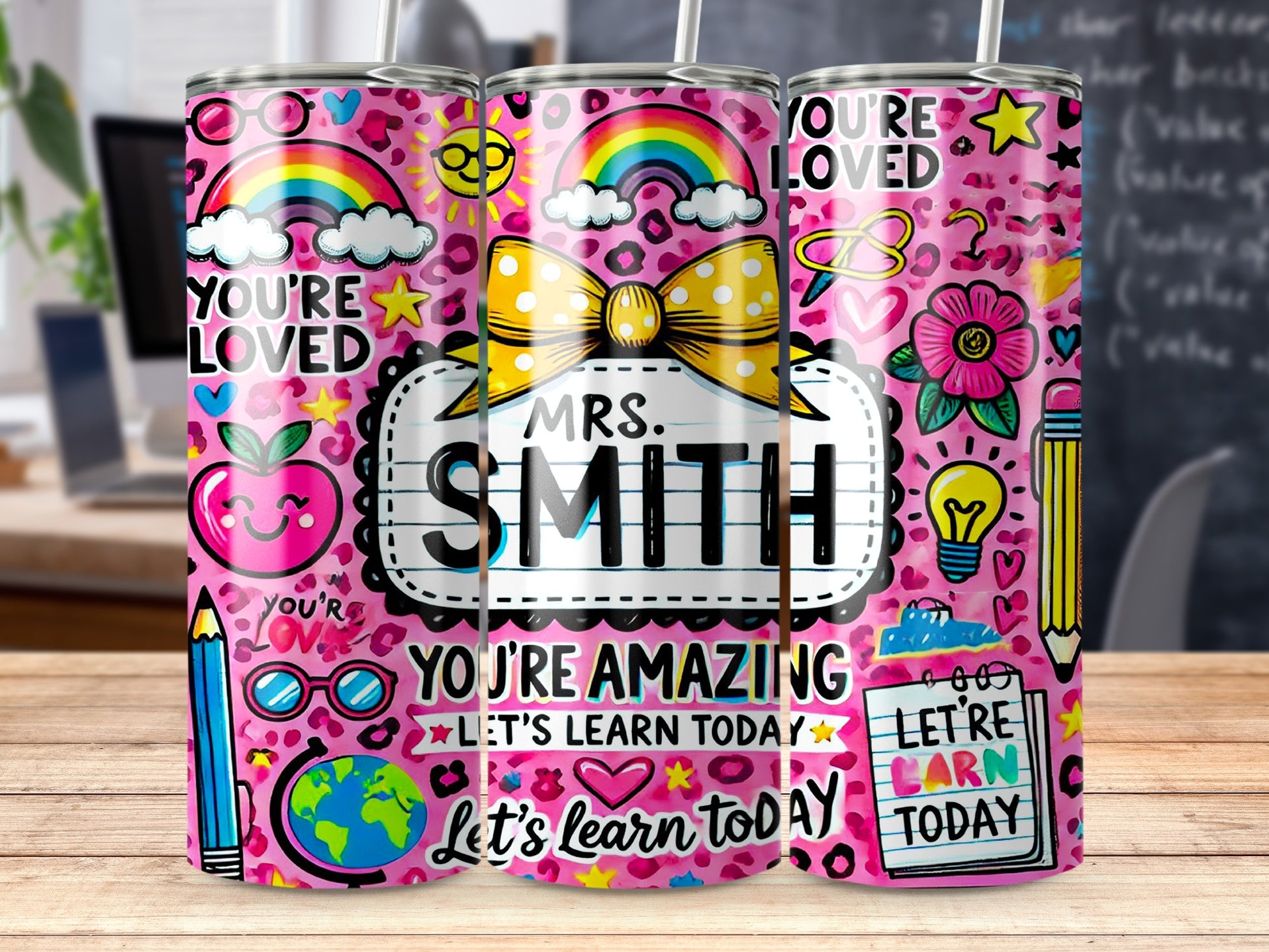 Pink tumbler with "You're Loved," "Mrs. Smith," and "You're Amazing" text.