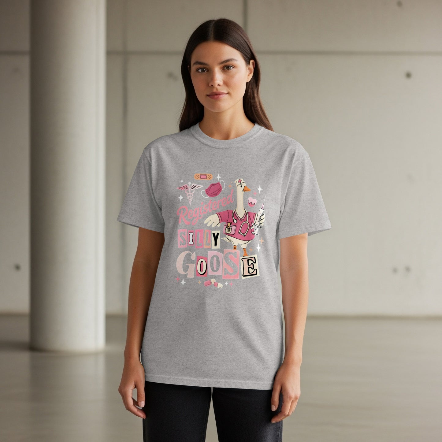 Grey t-shirt with "Registered Silly Goose" text and nursing cartoon.