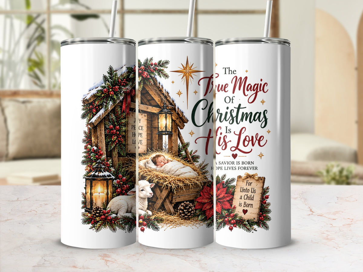 Three white skinny tumblers with straws feature a nativity scene and text reading The True Magic Of Christmas Is His Love.