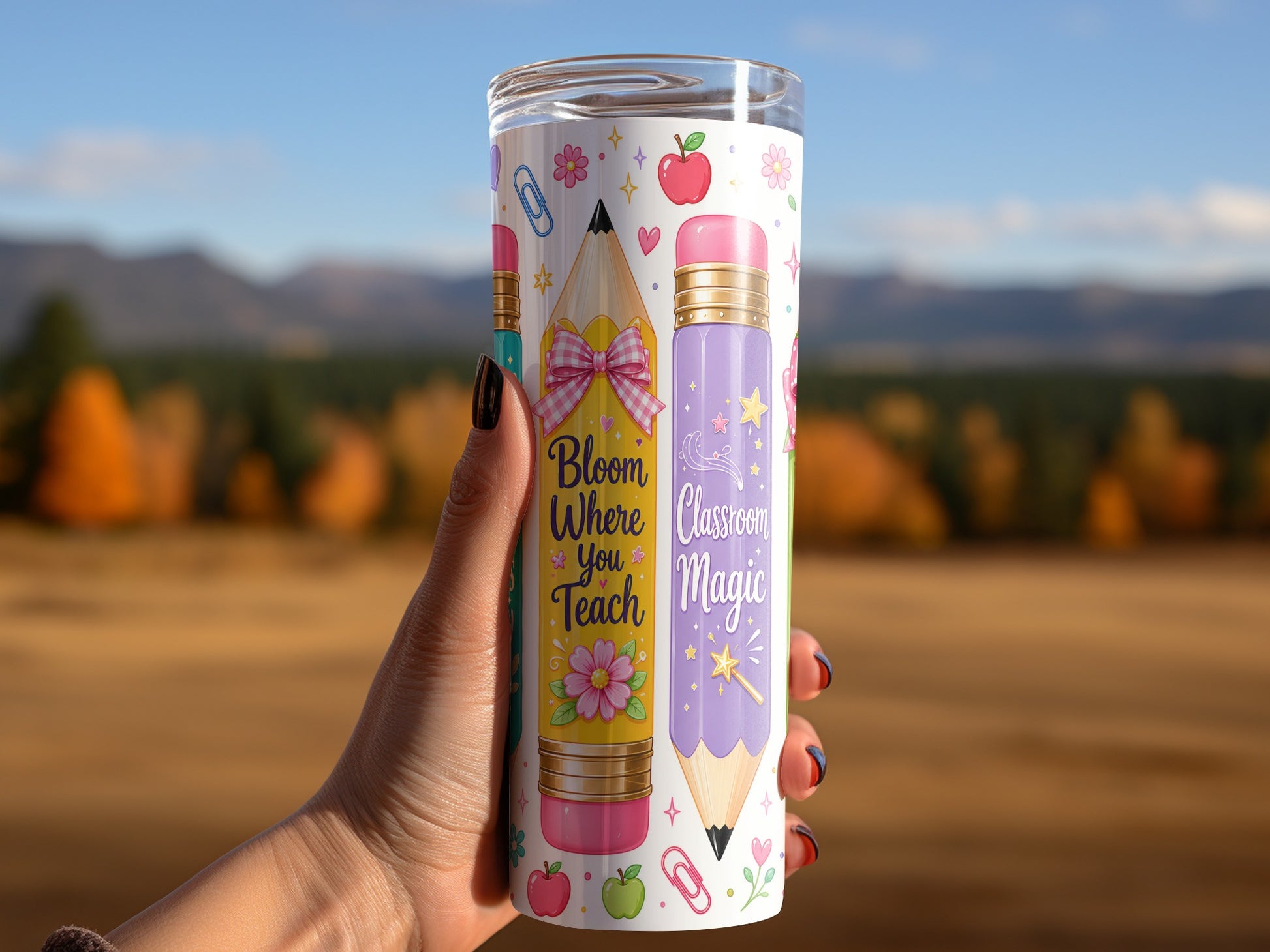 Tumbler with pencils, apples, and text "Bloom Where You Teach Classroom Magic."