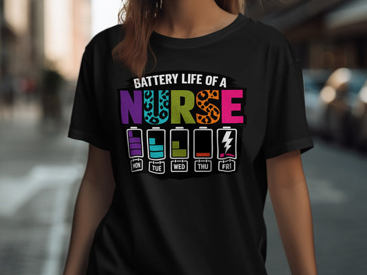 Black t-shirt with "Battery Life of a Nurse" and a battery icon chart.