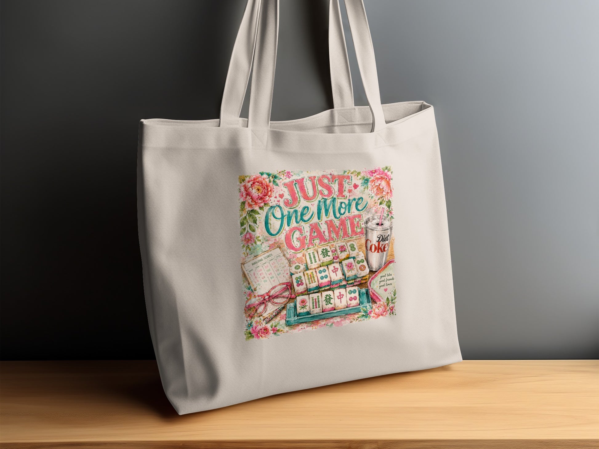 Tote bag with "Just One More Game" text and Mahjong set illustration.