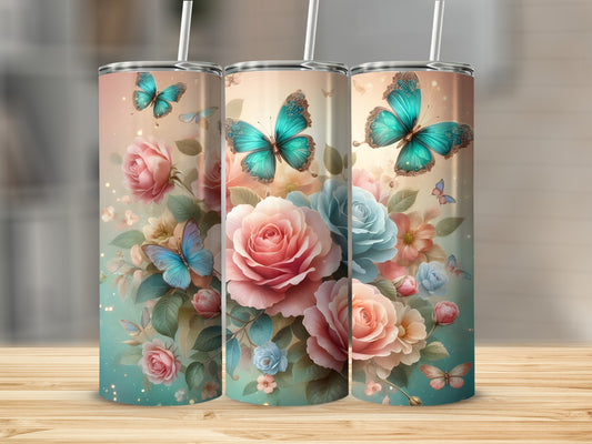Three tumblers with a floral and butterfly design on a wooden surface.