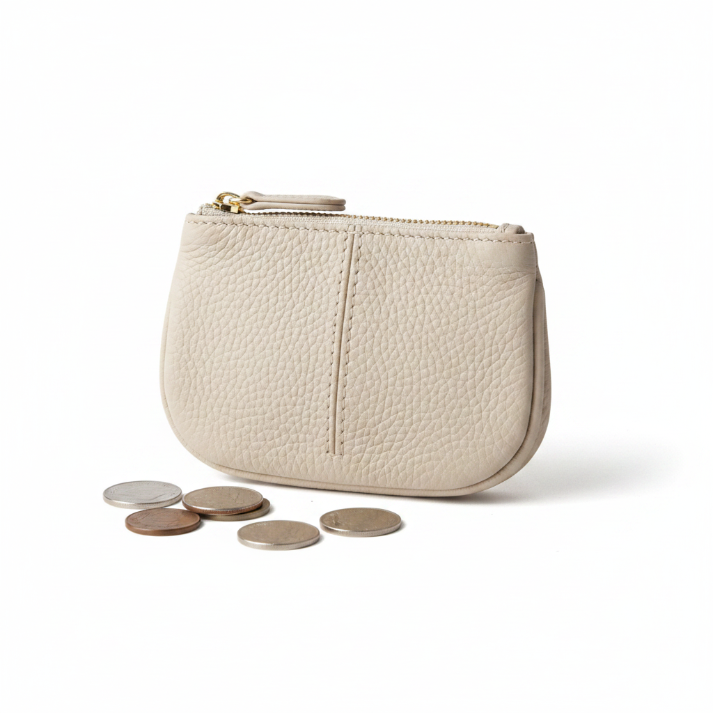 Cream genuine cowhide leather coin purse with gold zipper on white background