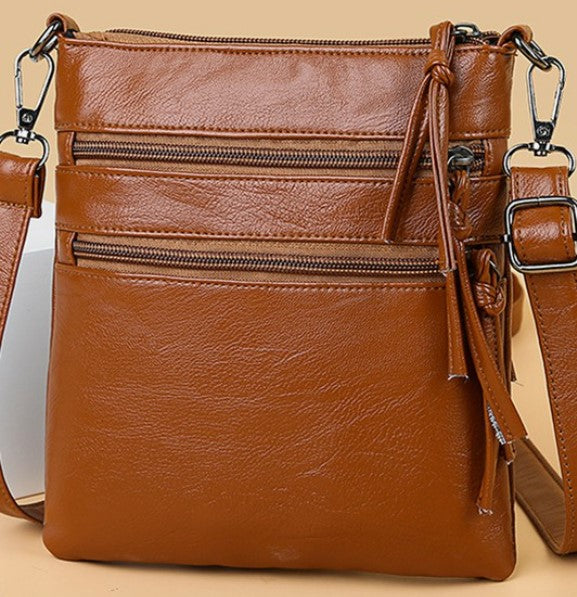 SOFT LEATHER VERTICAL ZIPPER SHOULDER BAG