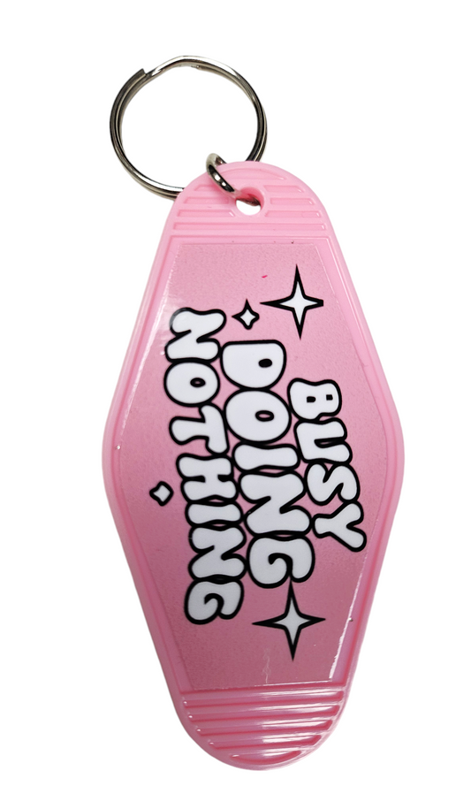 Busy Doing Nothing Motel Keychain