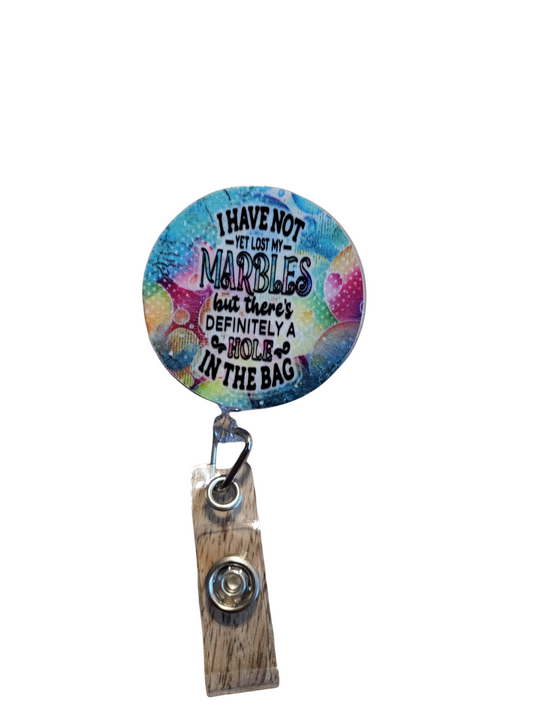 I Have Not Yet Lost My Marbles Badge Reel